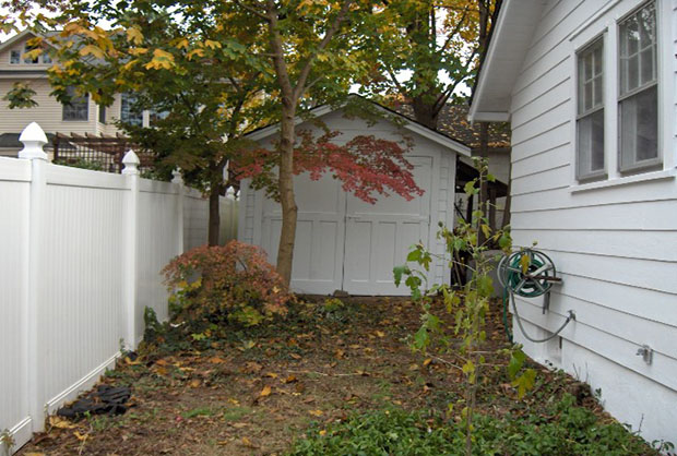 restored left side of house with shed